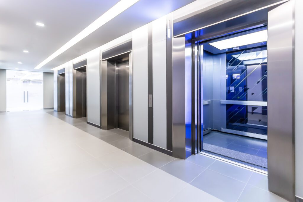 Modern steel elevator doors opened